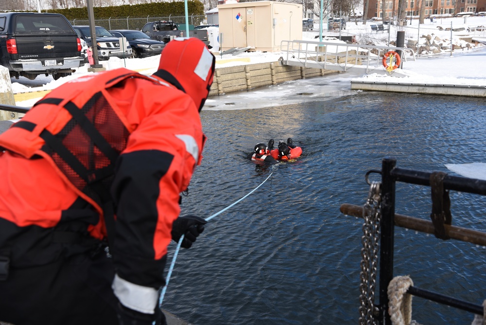 Coast Guard rescue crews practice retrieval techniques