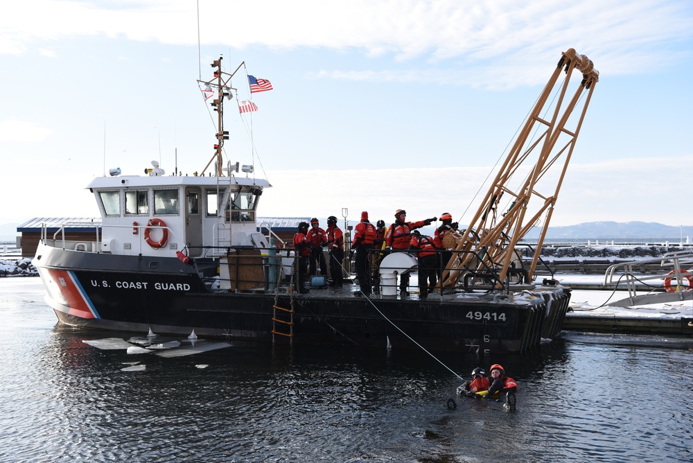 Coast Guard rescue crews perform ice rescue training