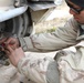 Soldier works on tank during Combined Resolve XIII