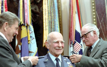 President Reagan and Senator Barry Goldwater present the fourth star to General Jimmy James Doolittle