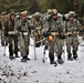 Fort McCoy Cold-Weather Operations Course students practice snowshoeing, ahkio sled use
