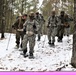 Fort McCoy Cold-Weather Operations Course students practice snowshoeing, ahkio sled use
