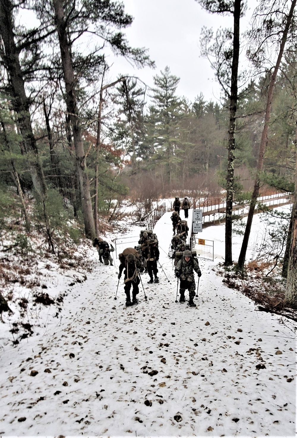 Fort McCoy Cold-Weather Operations Course students practice snowshoeing, ahkio sled use