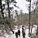 Fort McCoy Cold-Weather Operations Course students practice snowshoeing, ahkio sled use