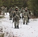 Fort McCoy Cold-Weather Operations Course students practice snowshoeing, ahkio sled use