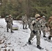 Fort McCoy Cold-Weather Operations Course students practice snowshoeing, ahkio sled use
