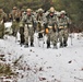 Fort McCoy Cold-Weather Operations Course students practice snowshoeing, ahkio sled use