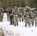 Fort McCoy Cold-Weather Operations Course students practice snowshoeing, ahkio sled use