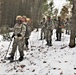 Fort McCoy Cold-Weather Operations Course students practice snowshoeing, ahkio sled use