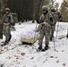 Fort McCoy Cold-Weather Operations Course students practice snowshoeing, ahkio sled use