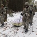 Fort McCoy Cold-Weather Operations Course students practice snowshoeing, ahkio sled use