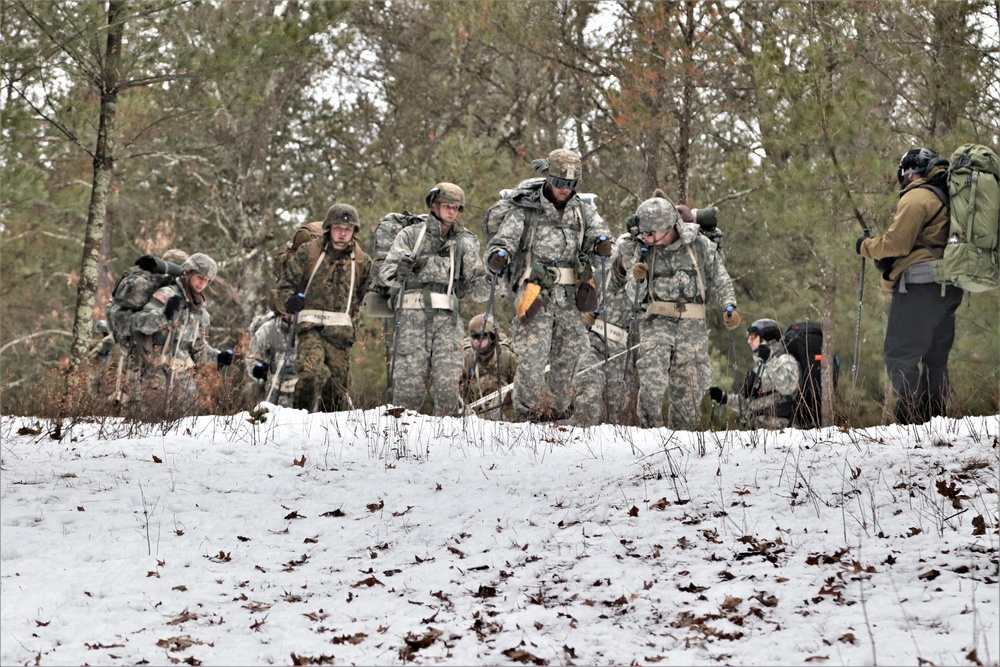 Fort McCoy Cold-Weather Operations Course students practice snowshoeing, ahkio sled use