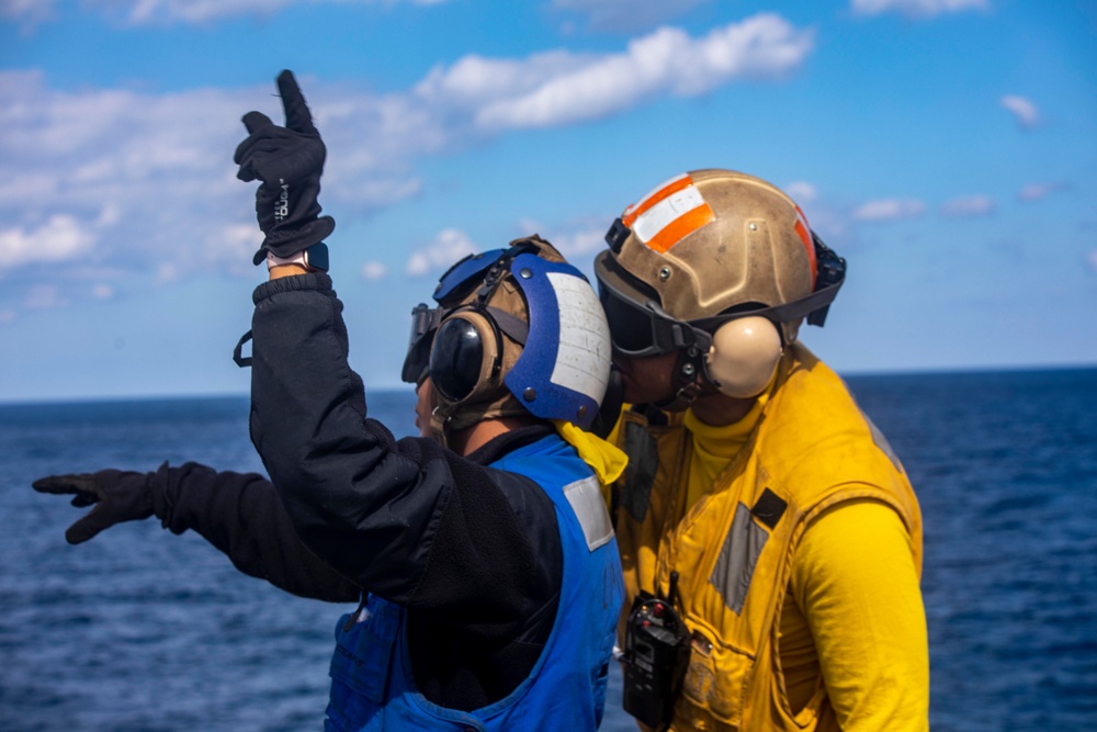 Sailors and Marines take part in flight operations