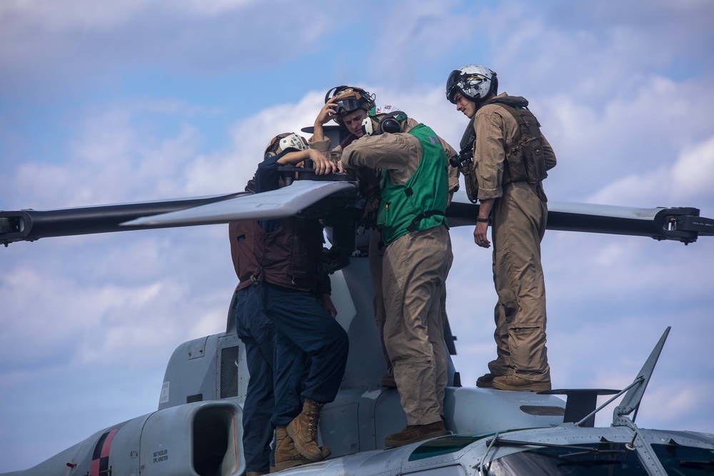 Sailors and Marines take part in flight operations