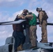 Sailors and Marines take part in flight operations