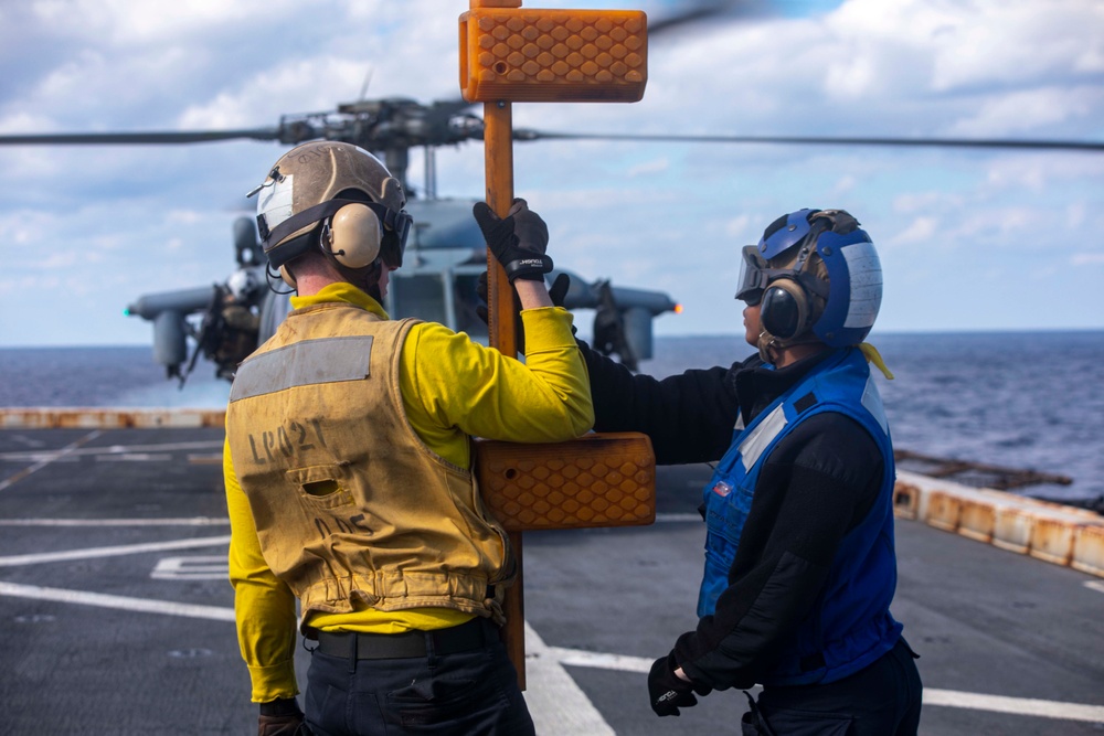 Sailors and Marines take part in flight operations