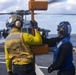 Sailors and Marines take part in flight operations