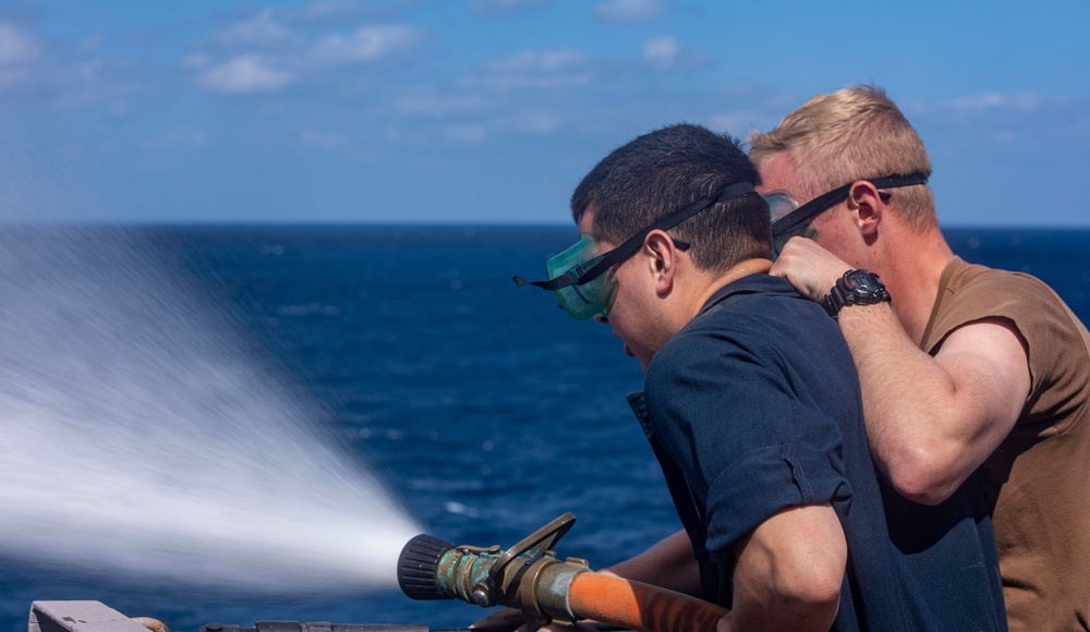 Sailors perform maintenance