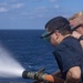 Sailors perform maintenance