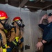 Sailors take part in a fire drill