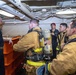 Sailors take part in a fire drill