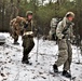 Fort McCoy Cold-Weather Operations Course students practice snowshoeing, ahkio sled use