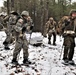 Fort McCoy Cold-Weather Operations Course students practice snowshoeing, ahkio sled use