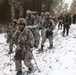 Fort McCoy Cold-Weather Operations Course students practice snowshoeing, ahkio sled use