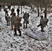 Fort McCoy Cold-Weather Operations Course students practice snowshoeing, ahkio sled use