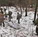 Fort McCoy Cold-Weather Operations Course students practice snowshoeing, ahkio sled use