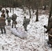 Fort McCoy Cold-Weather Operations Course students practice snowshoeing, ahkio sled use