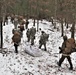 Fort McCoy Cold-Weather Operations Course students practice snowshoeing, ahkio sled use