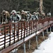 Cold-Weather Operations Course Class 20-02 students practice snowshoeing at Fort McCoy
