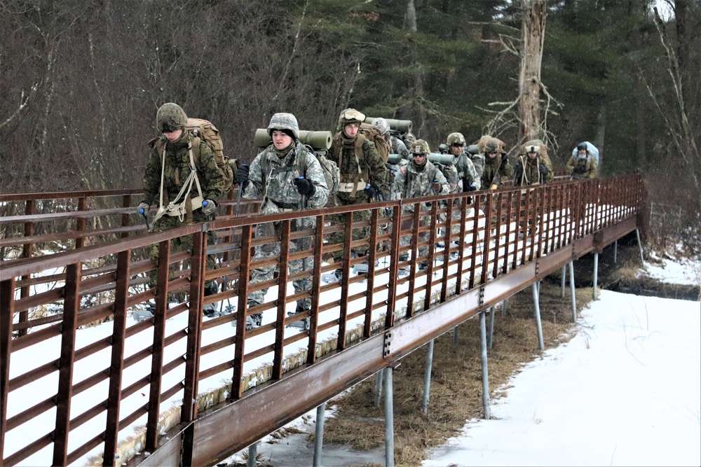 Cold-Weather Operations Course Class 20-02 students practice snowshoeing at Fort McCoy