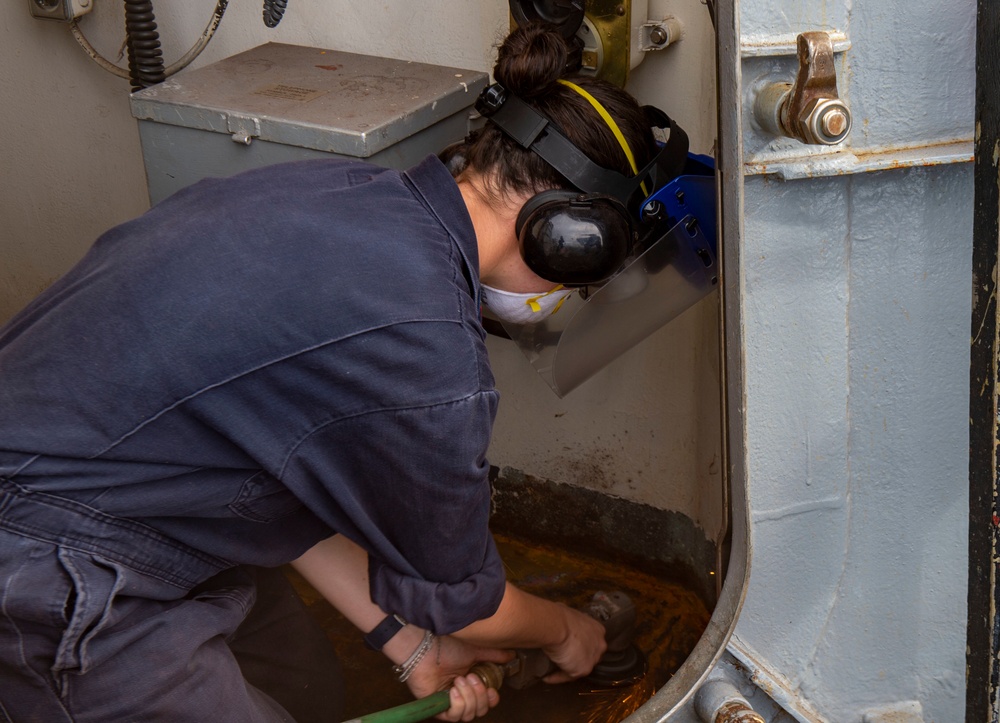 Sailors Work to Restore USS Barry