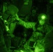 1st SOSS combat medics provide medical care to patients onboard a C-145A