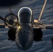 Deployed KC-10 refuels F/A-18 Hornets