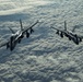 Deployed KC-10 refuels F/A-18 Hornets