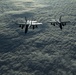 Deployed KC-10 refuels F/A-18 Hornets