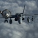 Deployed KC-10 refuels F/A-18 Hornets