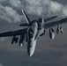 Deployed KC-10 refuels F/A-18 Hornets