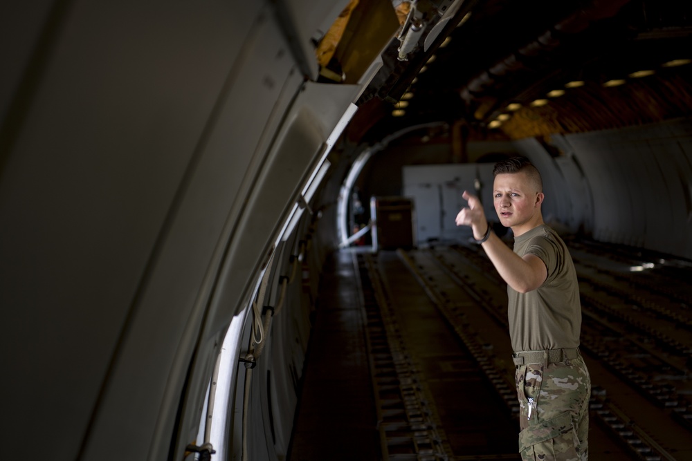 Deployed KC-10 refuels F/A-18 Hornets