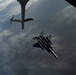 Deployed KC-10 refuels F-15 Strike Eagles