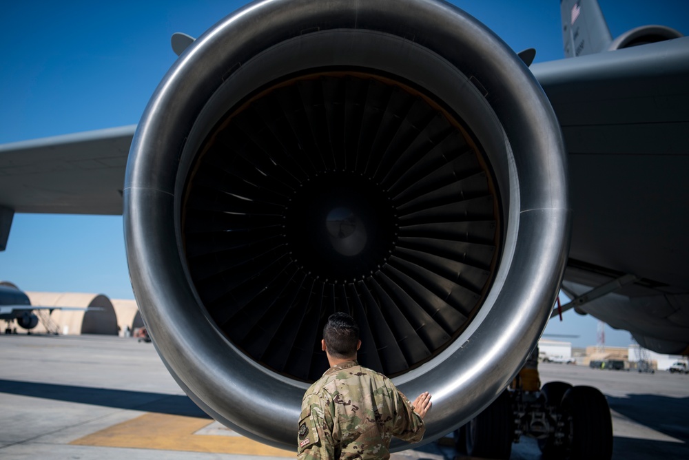 Deployed KC-10 refuels F-15 Strike Eagles