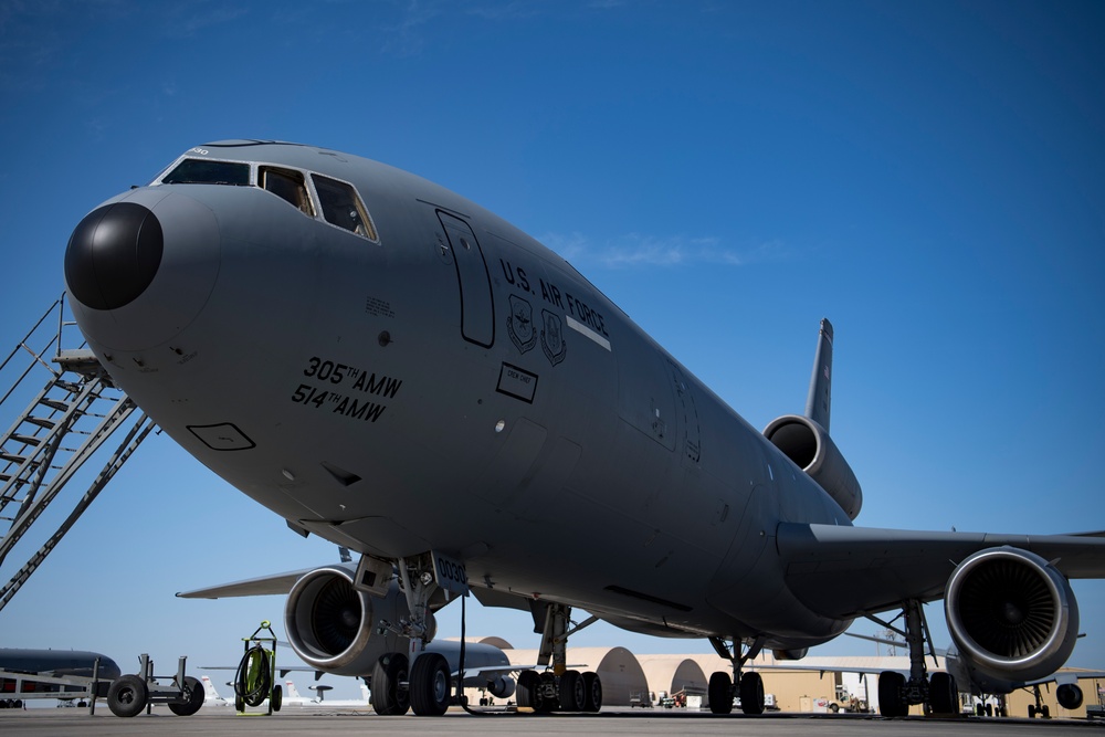 Deployed KC-10 refuels F-15 Strike Eagles