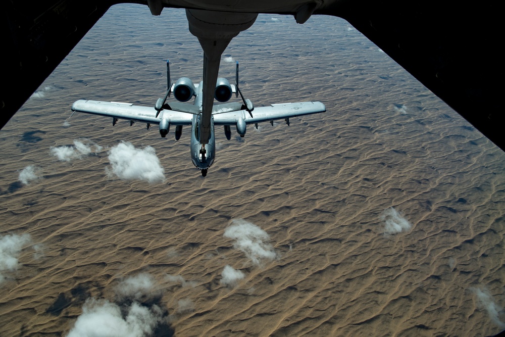 Deployed KC-10 refuels A-10s