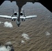 Deployed KC-10 refuels A-10s