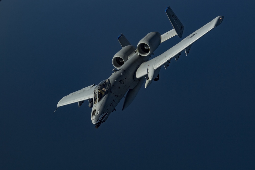 Deployed KC-10 refuels A-10s