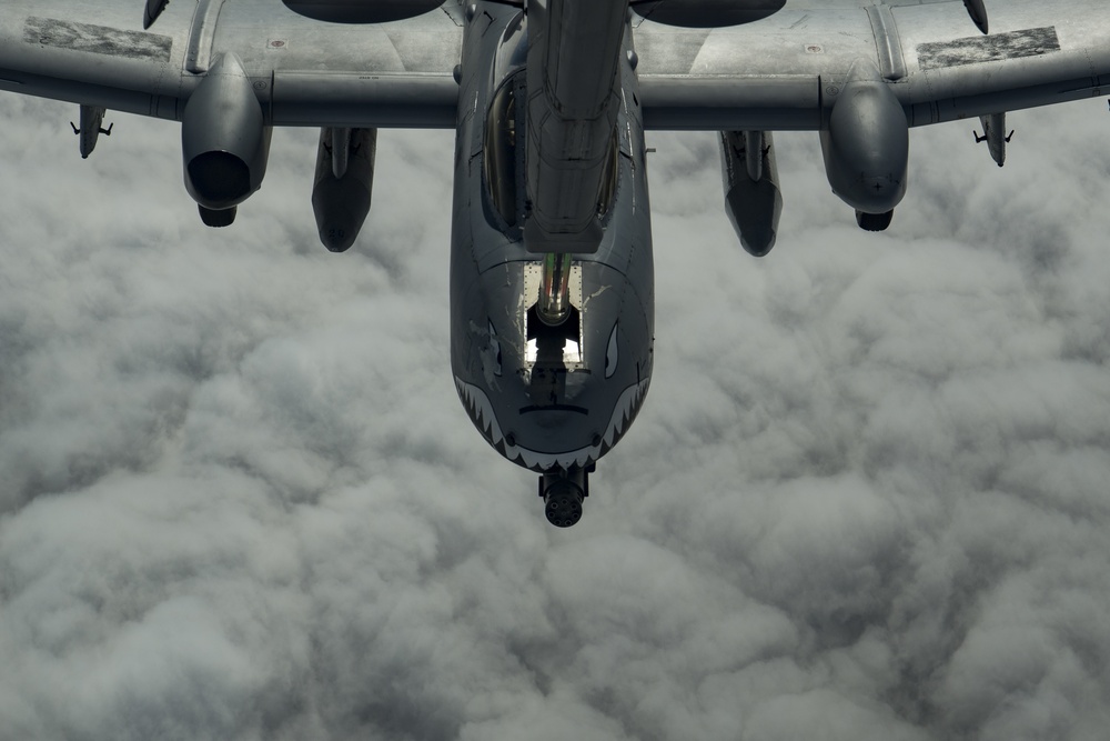 Deployed KC-10 refuels A-10s