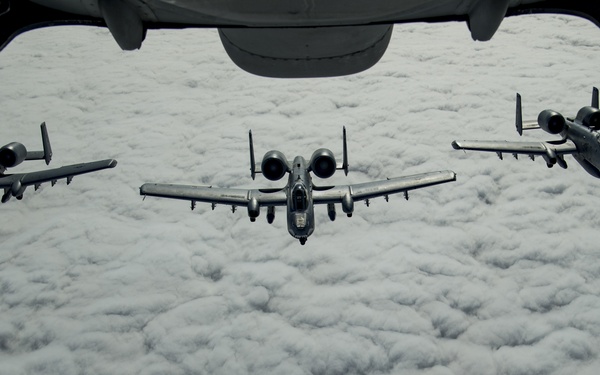 Deployed KC-10 refuels A-10s